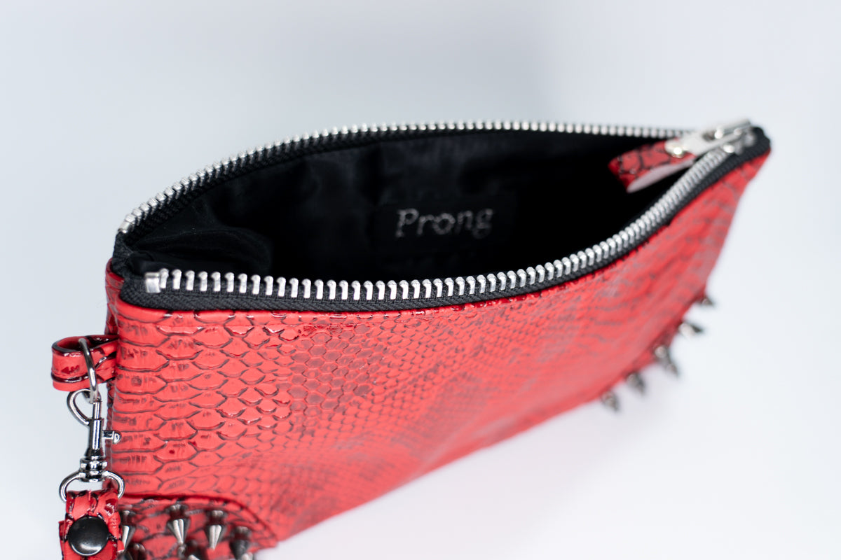 Clutch bag w/ spikes in Red Snake