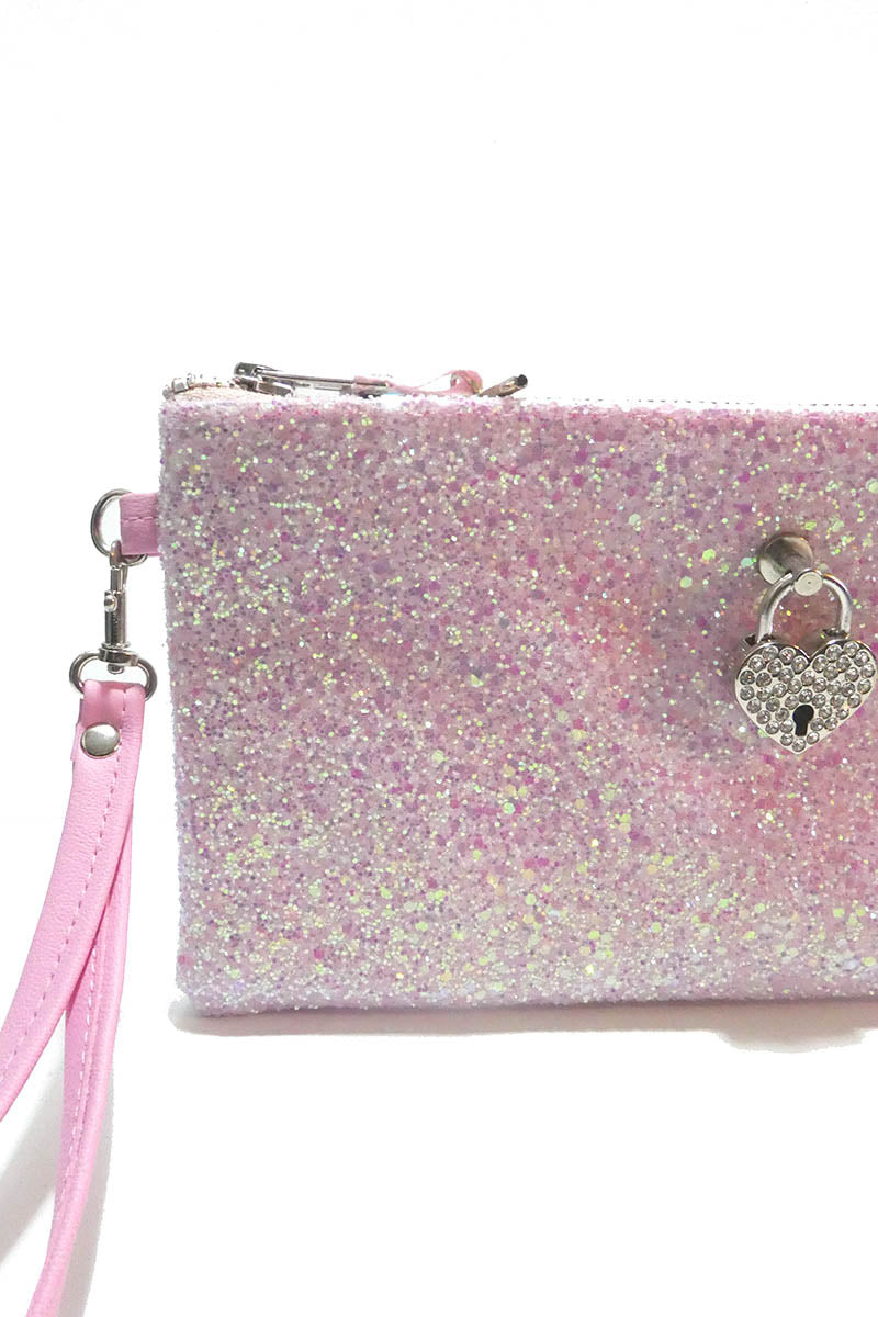 Glittery pink pouch with a heart-shaped lock on a white background