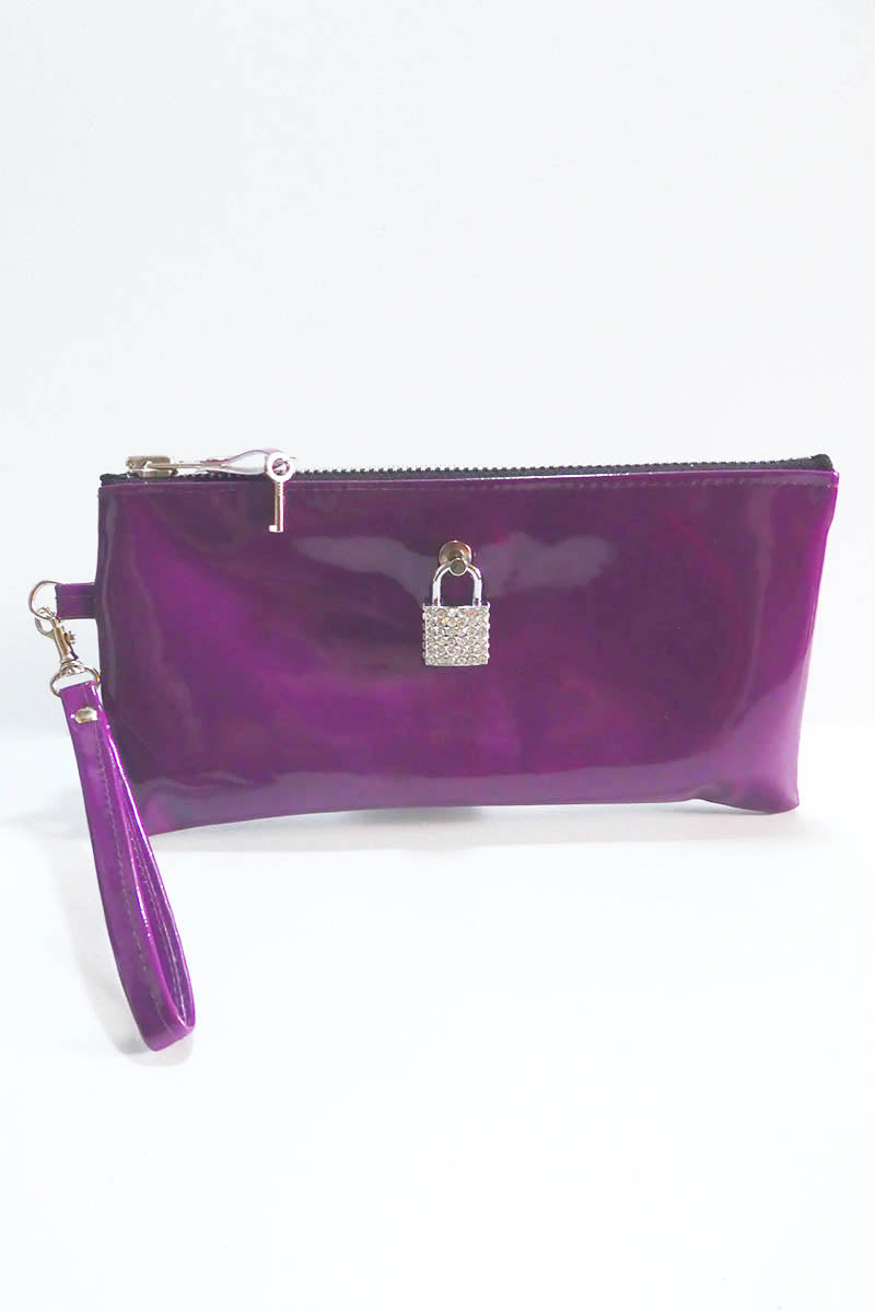 Purple clutch bag with a wrist strap and decorative lock on a white background