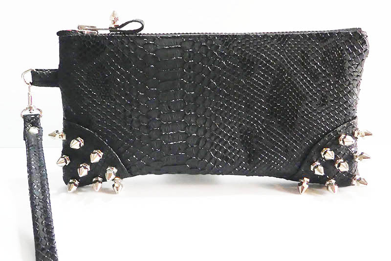 Black faux leather clutch bag with a snake pattern, featuring spiked corners and a silver zipper, on a white background.