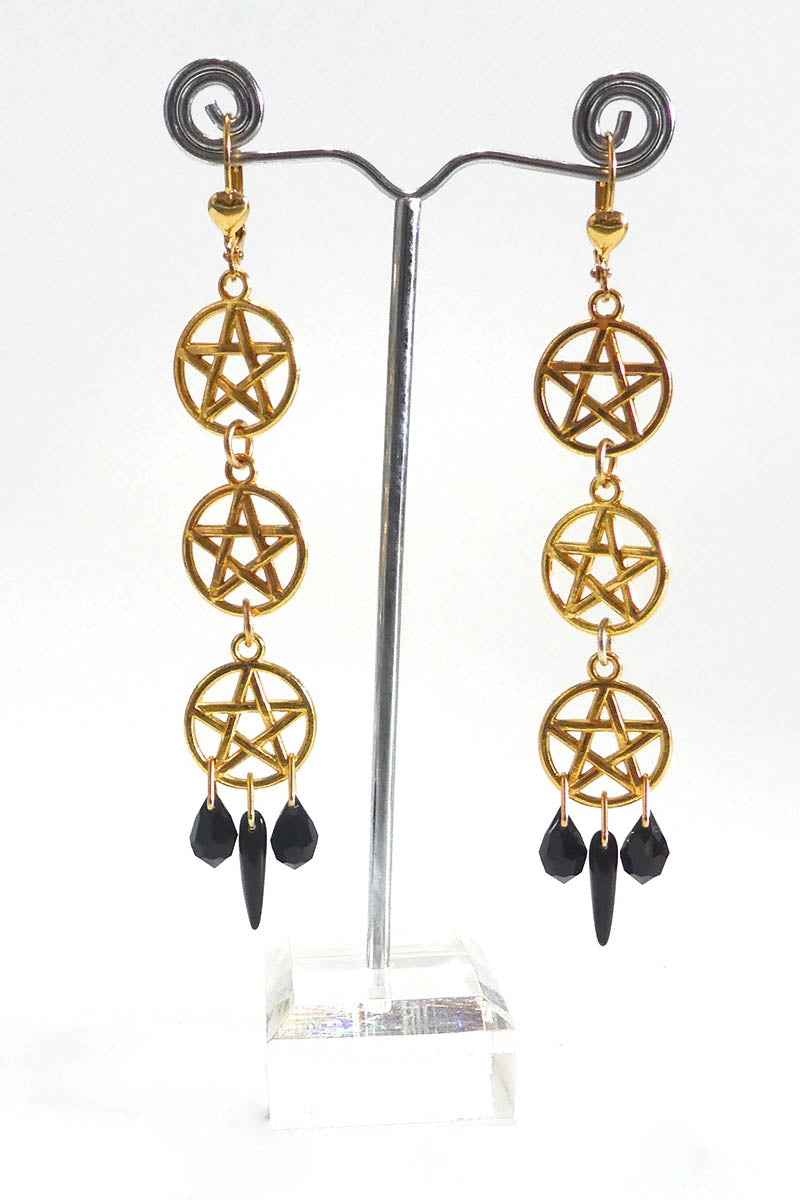 Triple Pentagrams in Gold