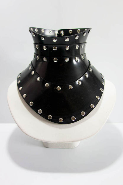 Black studded choker on a white background
