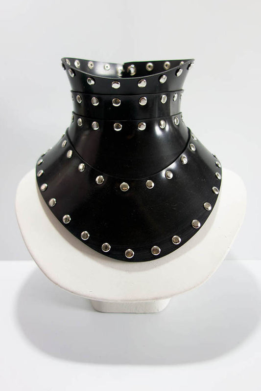 Black studded choker on a white background