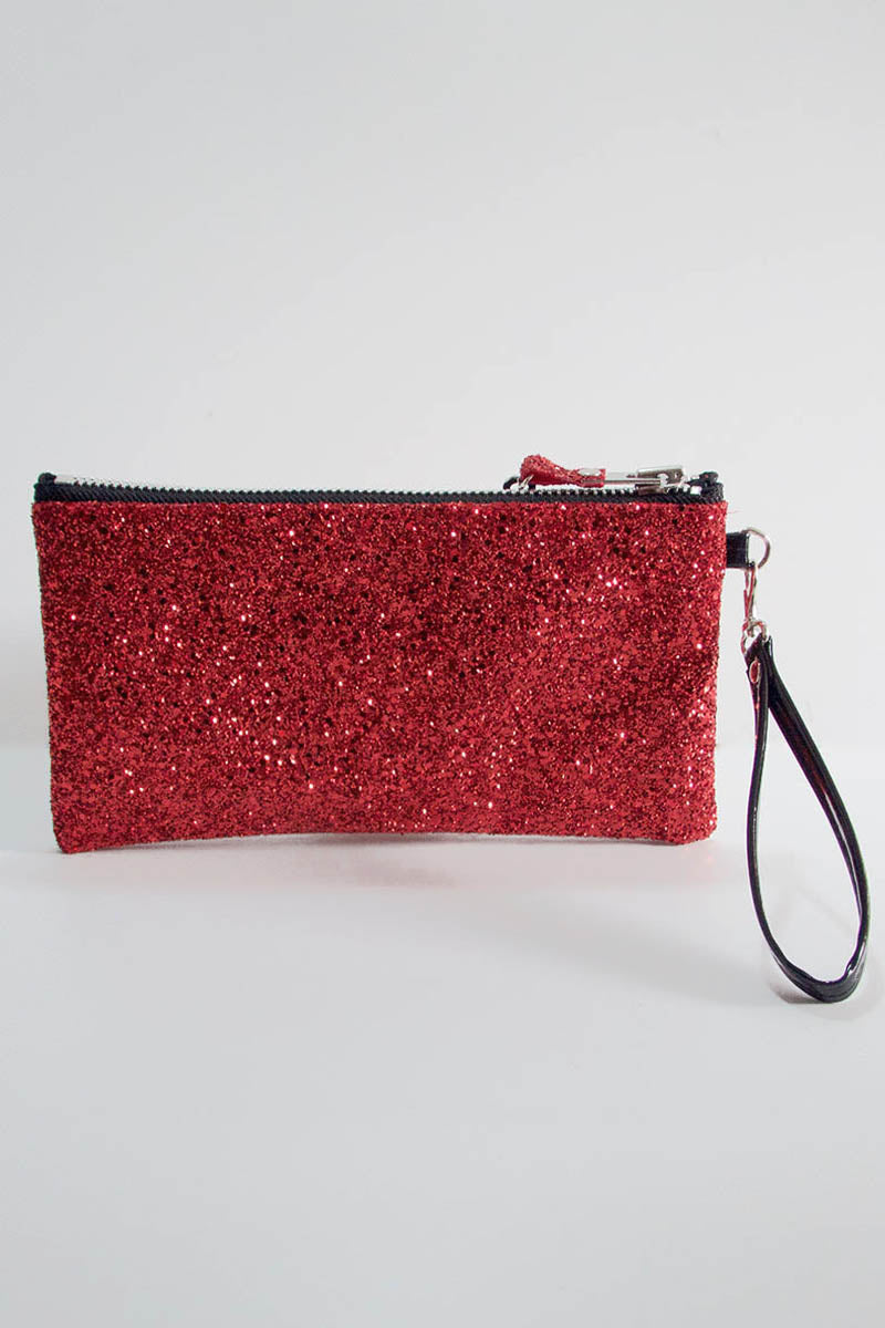 Red glittery pouch with a black wrist strap on a light gray background