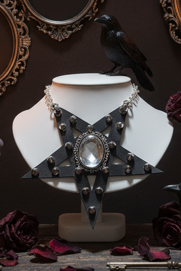 Gothic-style display with candles, roses, and a necklace on a dark background