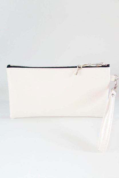 White clutch bag with a strap on a light gray background