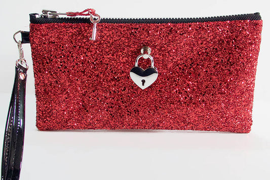 Red glittery pouch with a heart-shaped lock on a white background