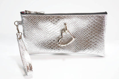 Silver clutch bag with a strap on a white background