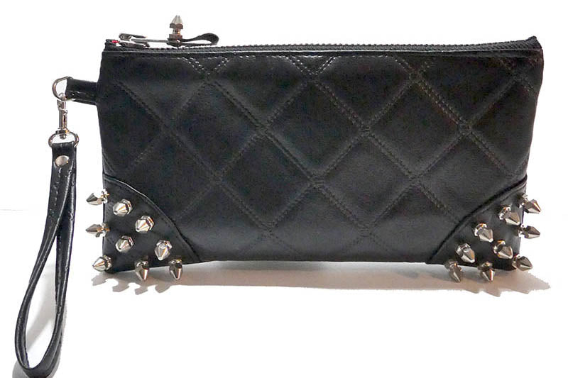 Clutch bag w/ spikes in Quilted Leatherette