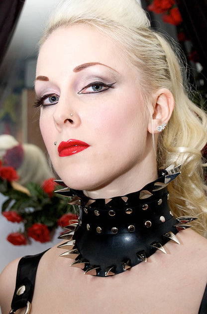 Mistress wears a spectacular posture collar with claws